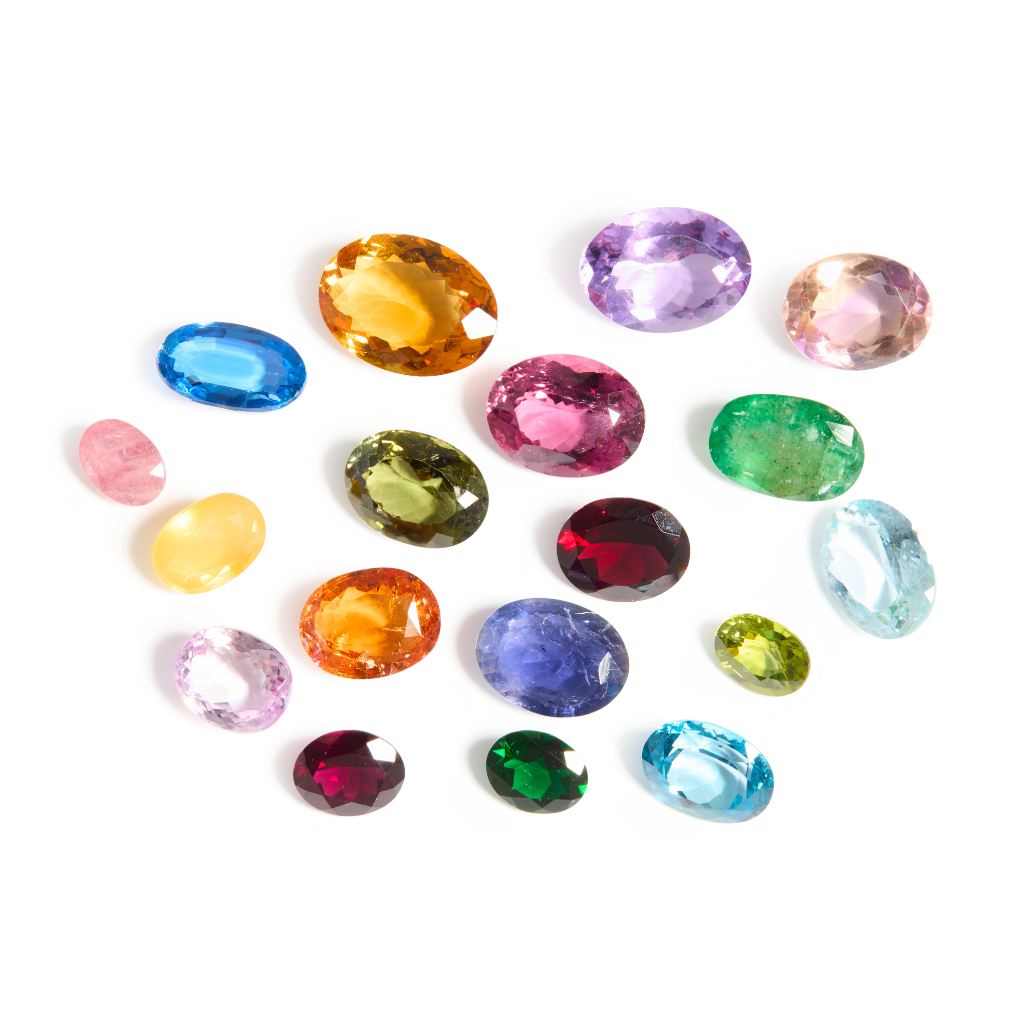 A collection of unmounted gemstones