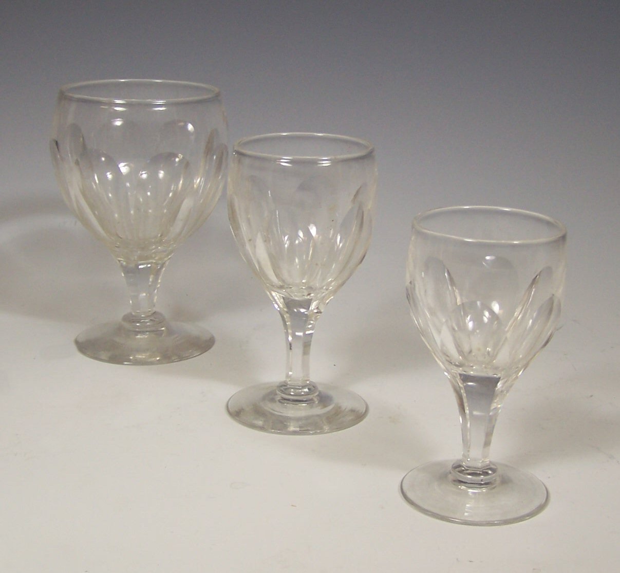 A large suite of glasses,