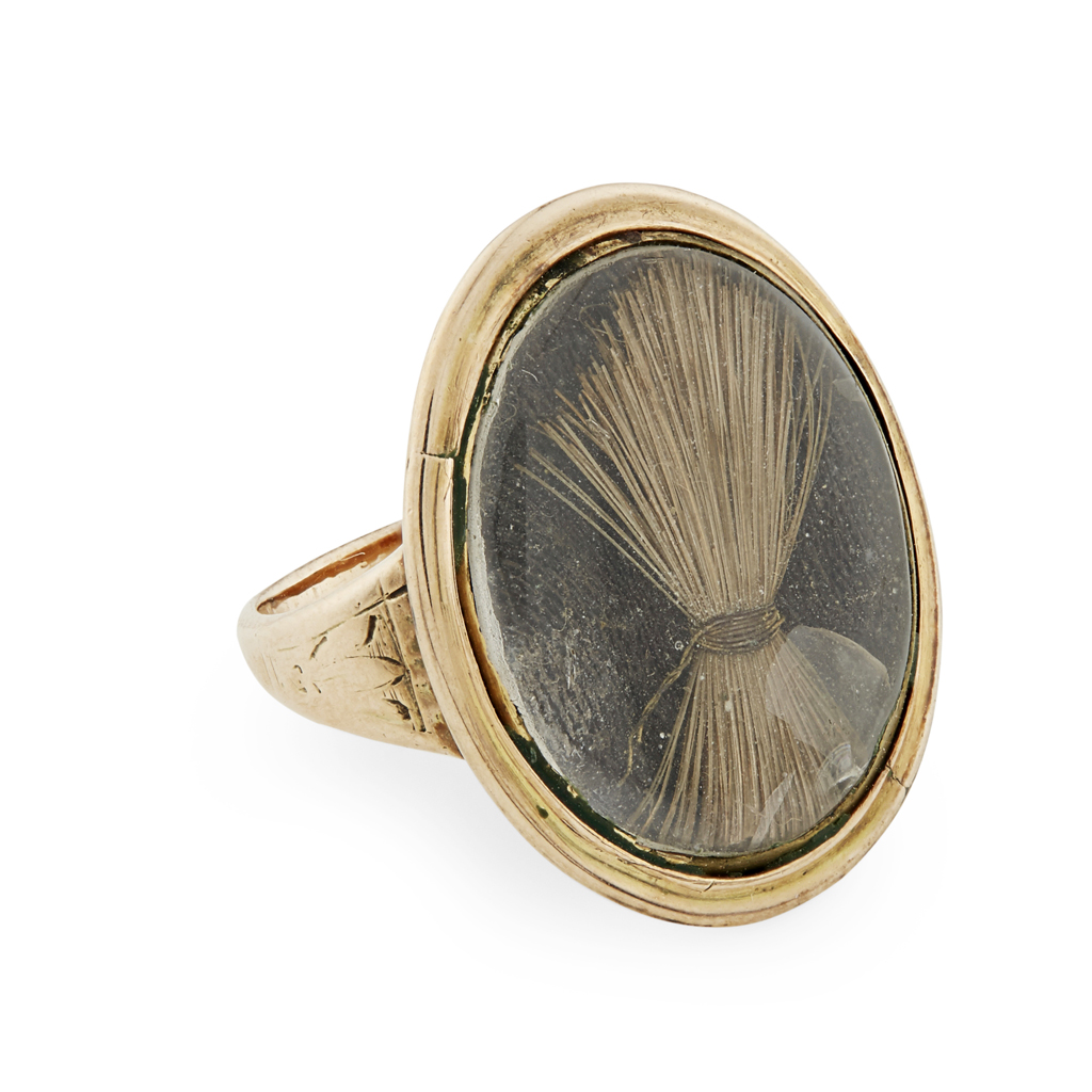 A GOLD MOUNTED RING ENCLOSING A LOCK OF PRINCE CHARLES EDWARD STUART'S HAIR