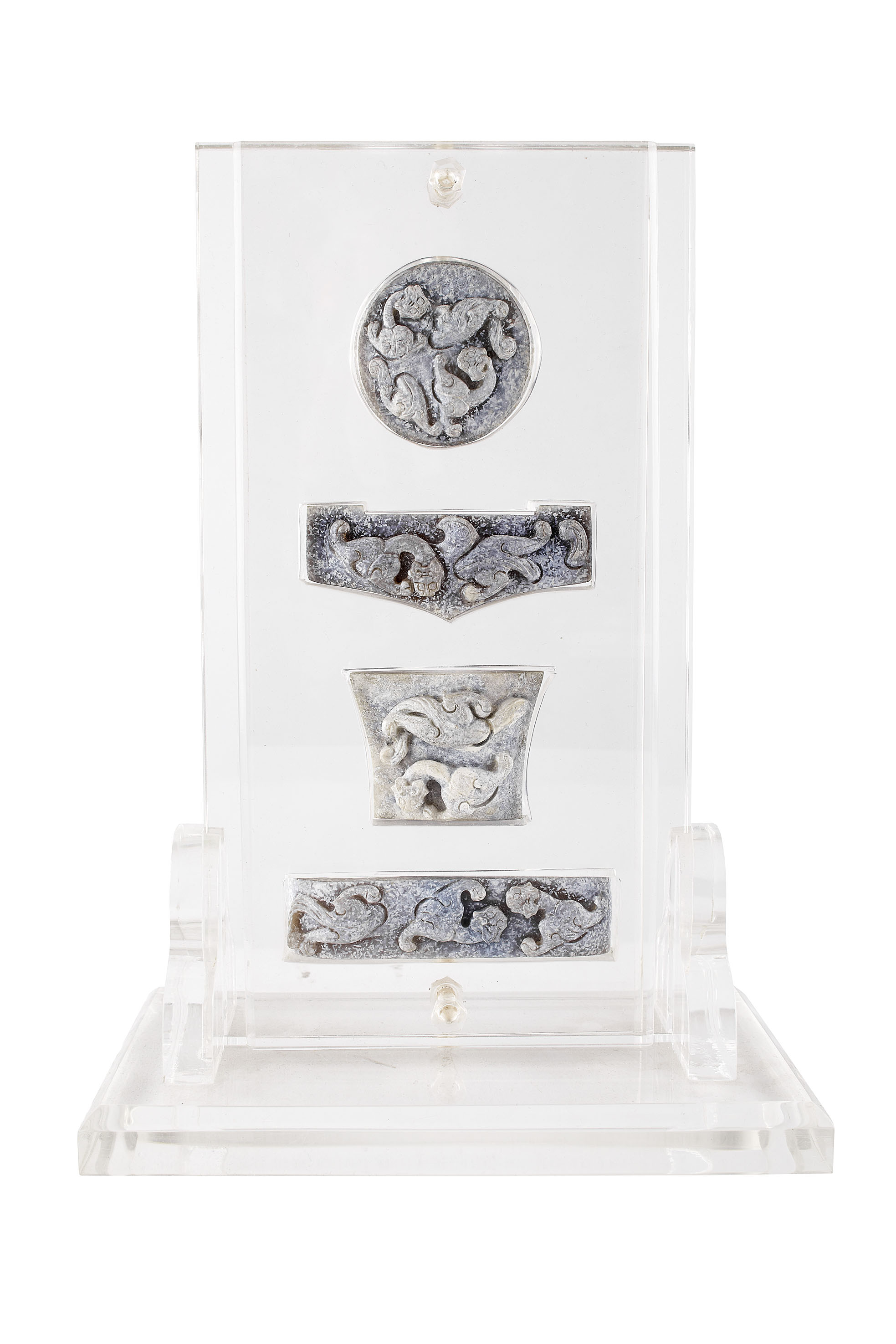 FOUR CHINESE CALCIFIED JADE MOUNTS