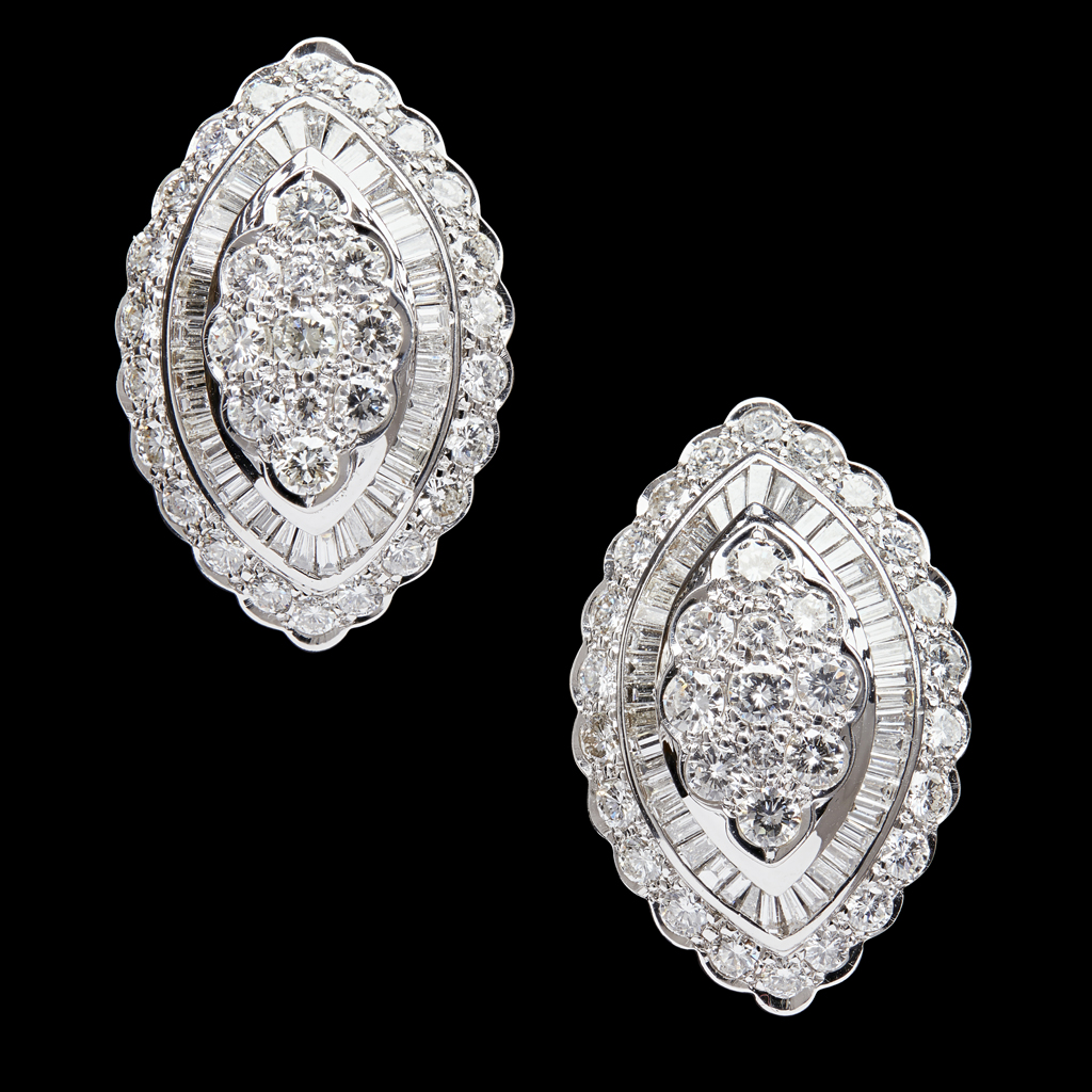 A pair of diamond set earrings