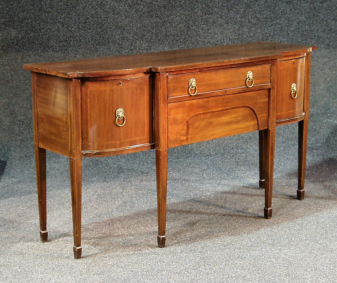 An Edwardian mahogany breakfront sideboard