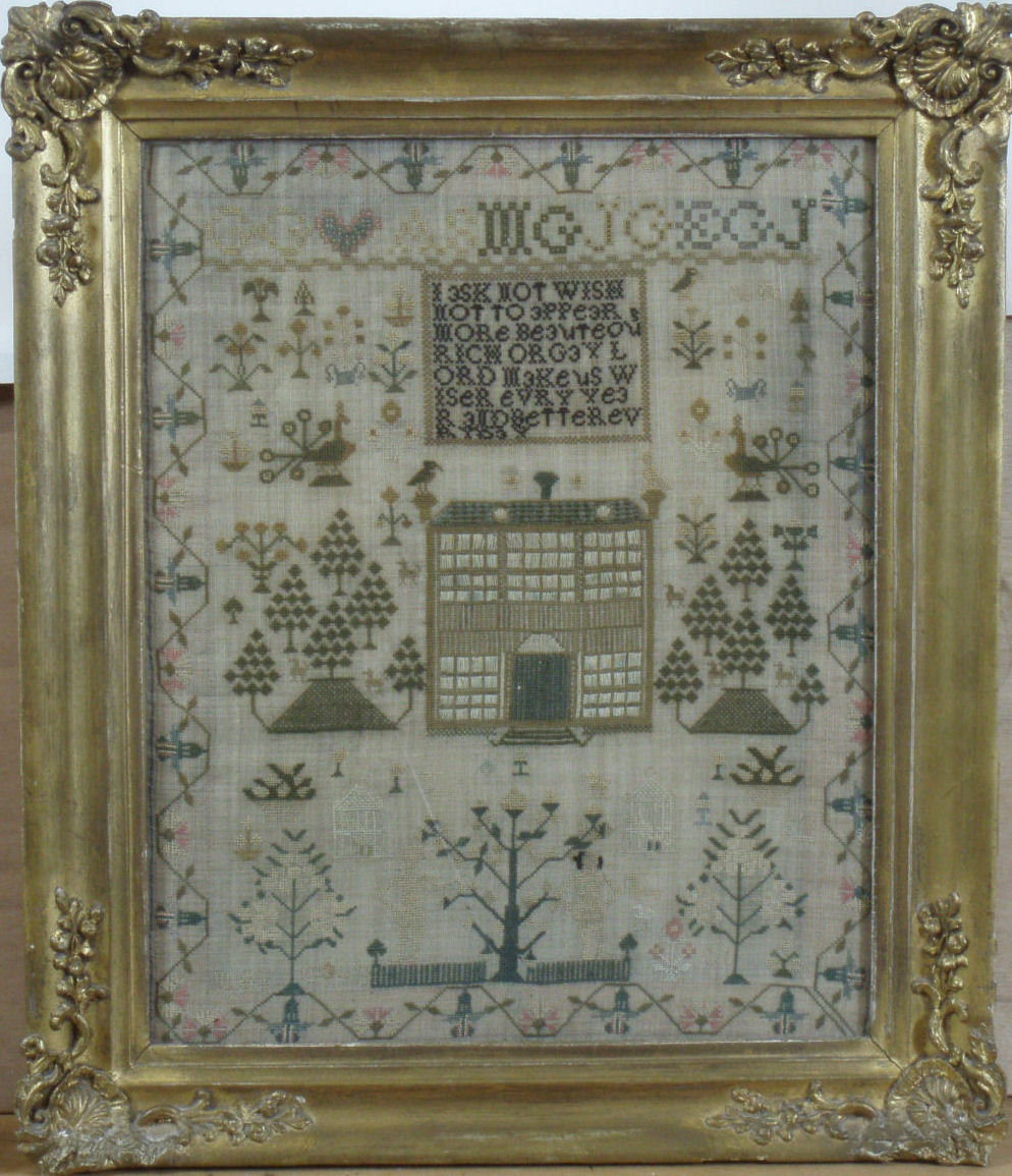 An early 19th century sampler of a house