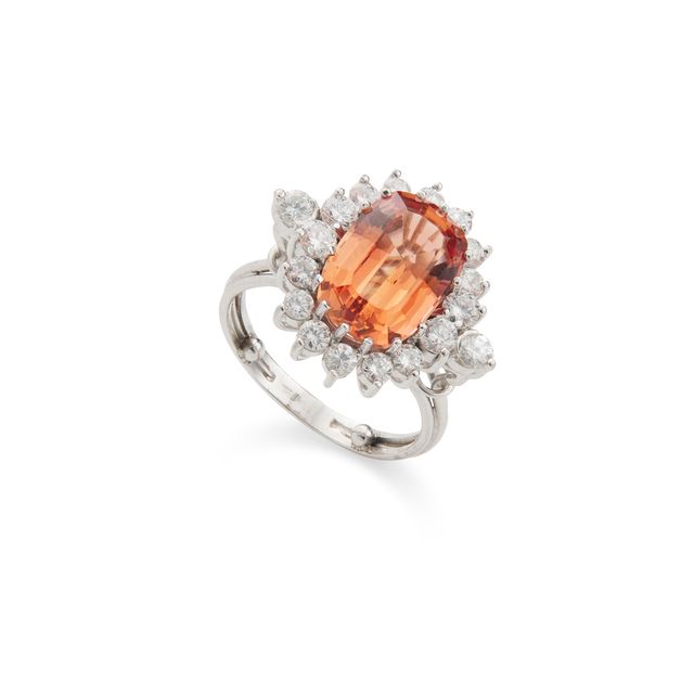 A topaz and diamond cluster ring