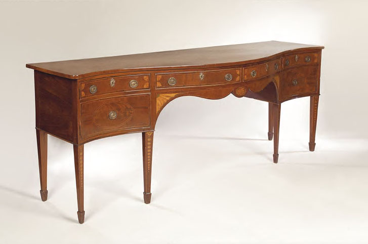 A large early 19th century mahogany and inlaid serpentine sideboard,