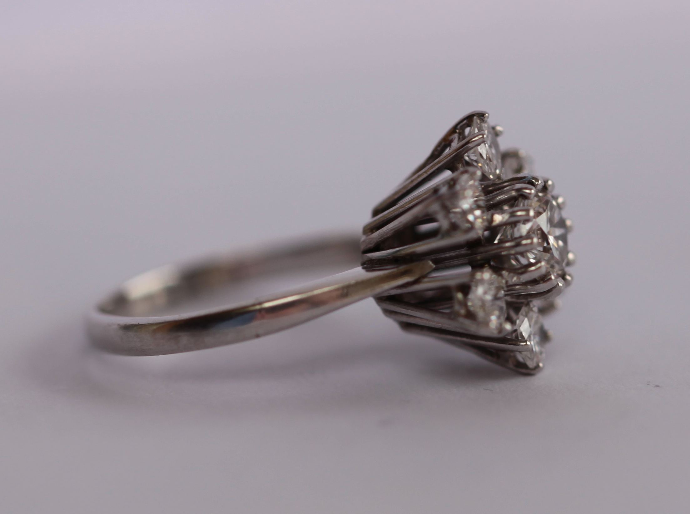 A diamond set cluster ring