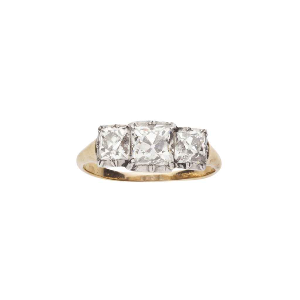An early 20th century diamond set three-stone ring