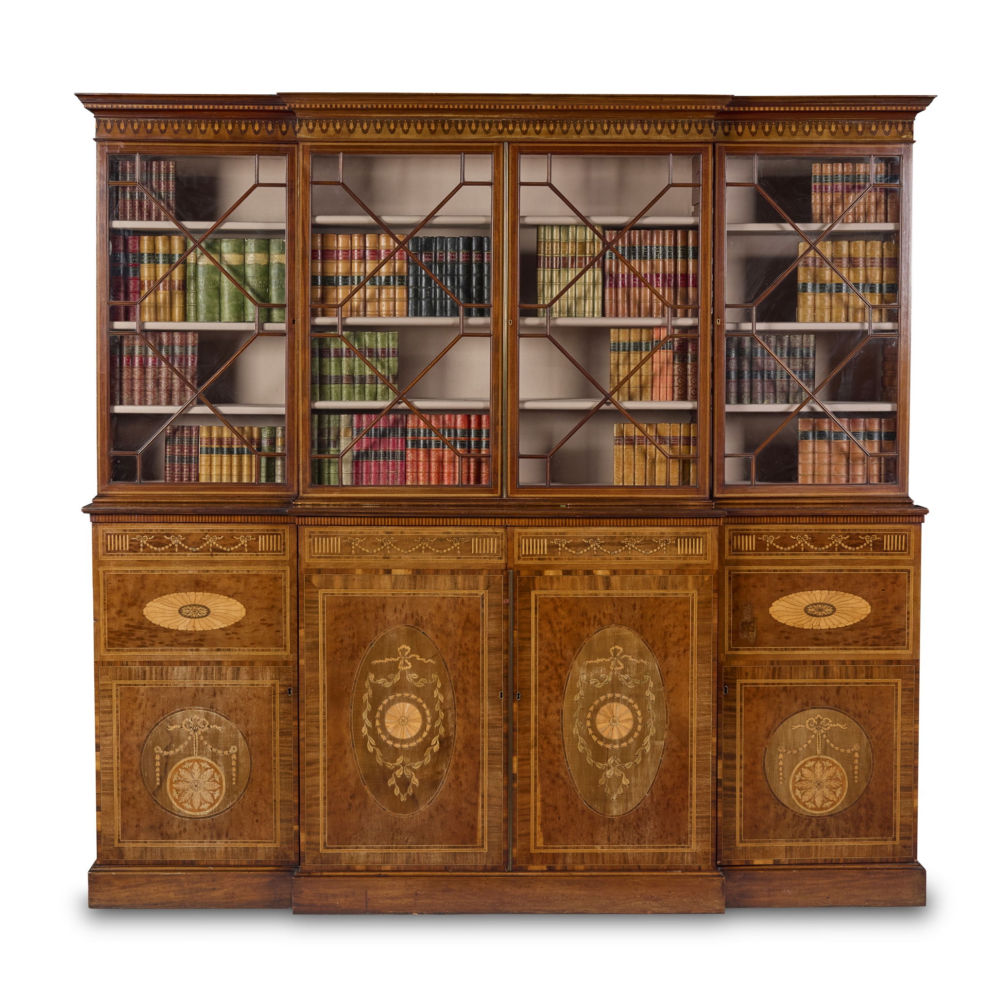 GEORGE III MAHOGANY AND MARQUETRY BREAKFRONT BOOKCASE