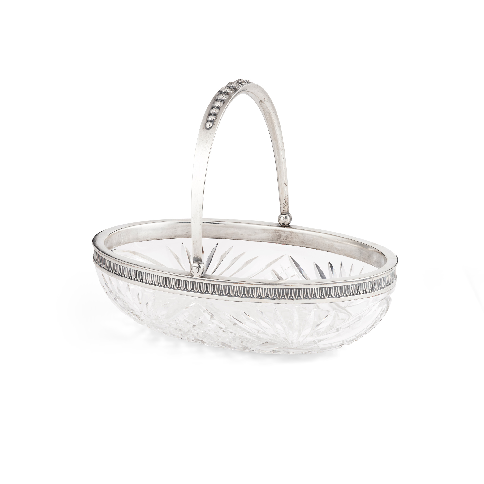 AN EARLY 20TH CENTURY RUSSIAN SILVER MOUNTED GLASS SWING-HANDLED BASKET