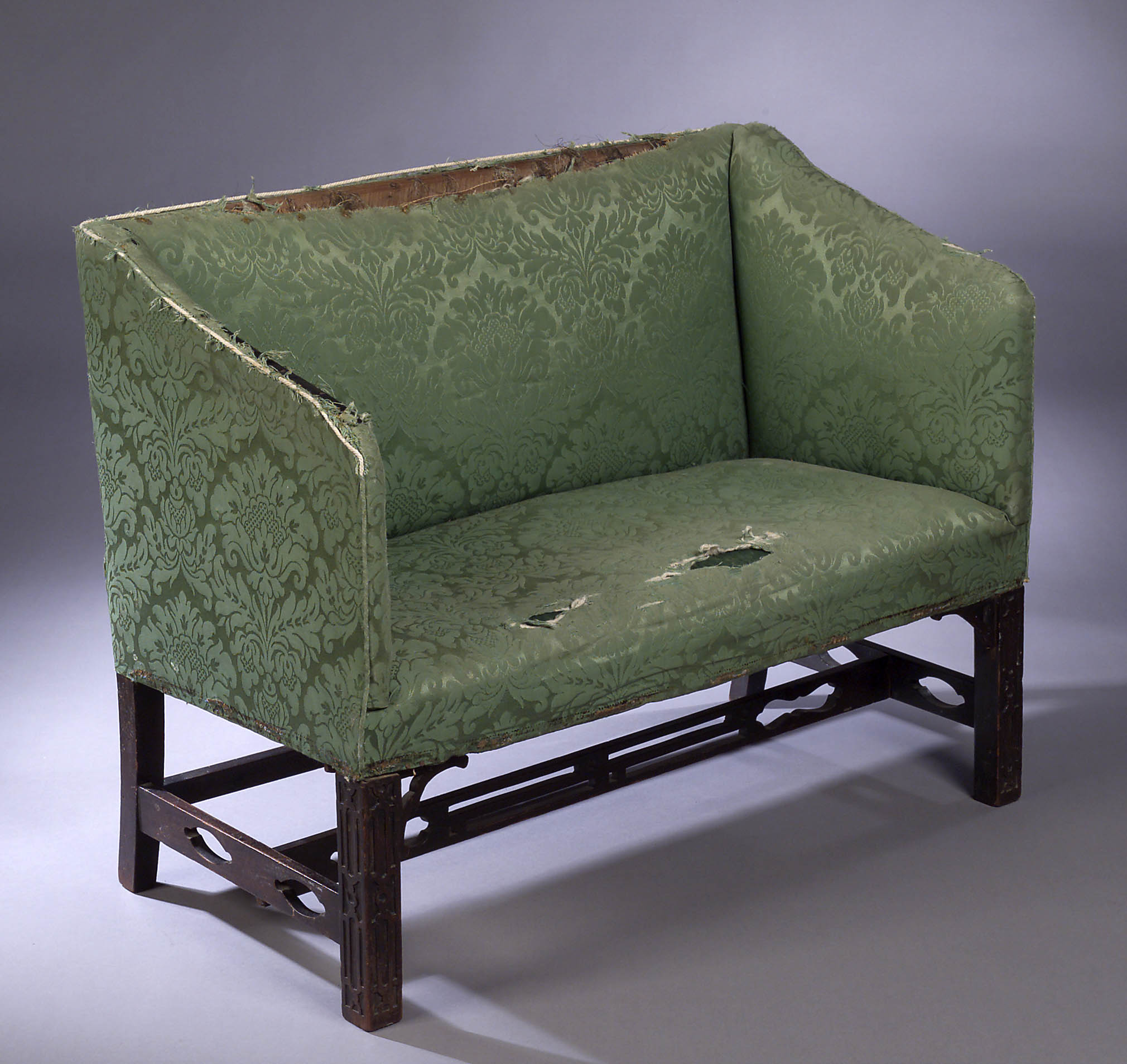 An early 19th century mahogany framed settee