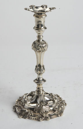 A George III cast silver table candlestick