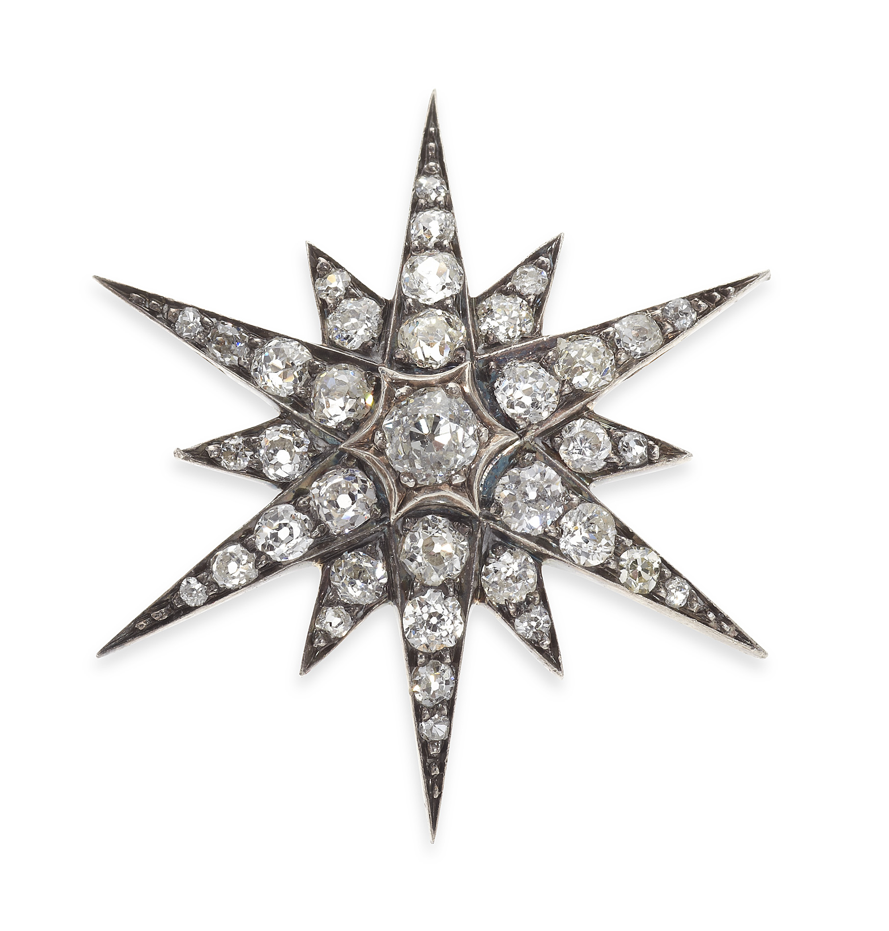 A late Victorian diamond set star brooch