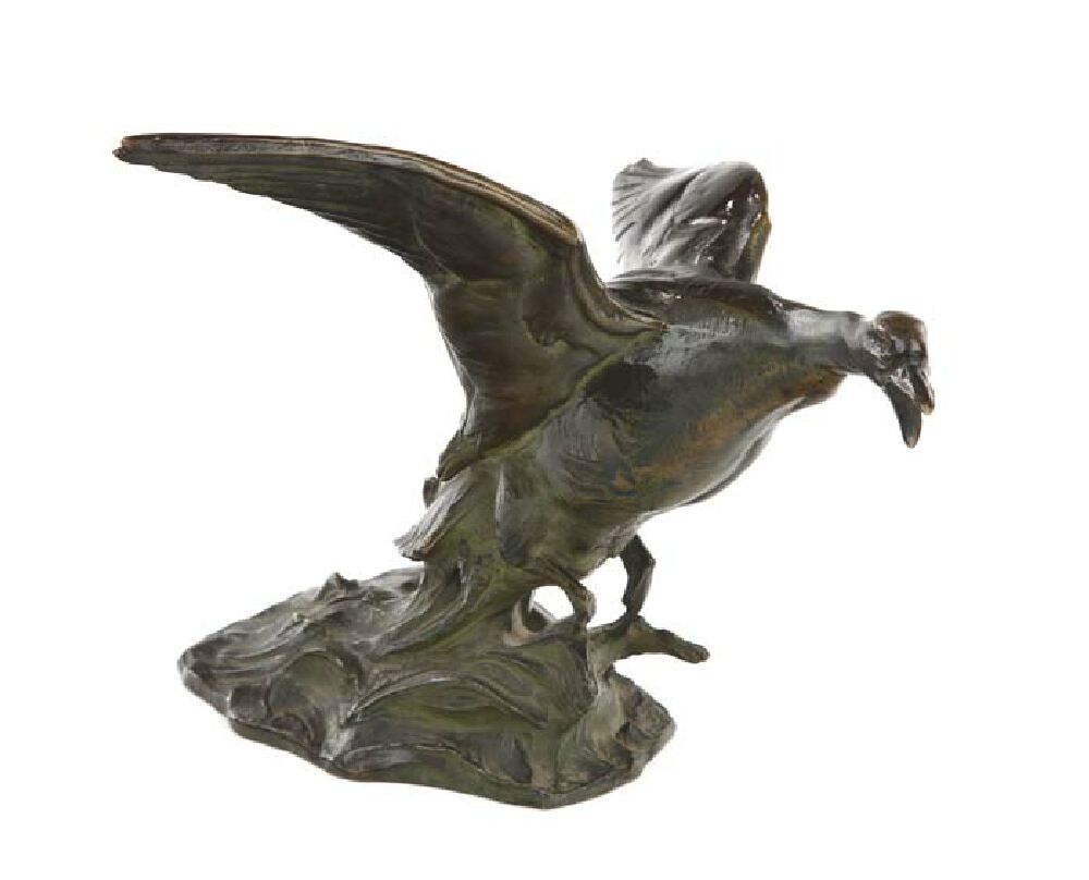 A patinated bronze figure of a mallard