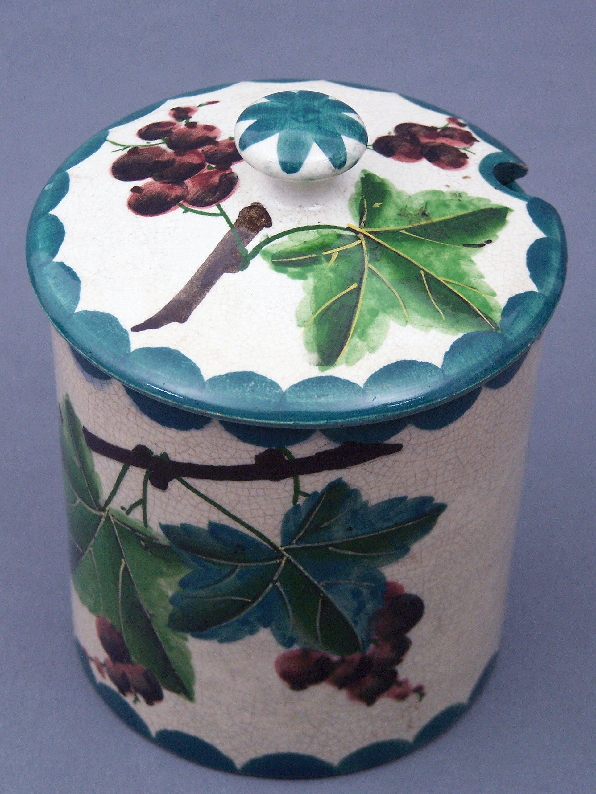 A Wemyss preserve jar and cover,