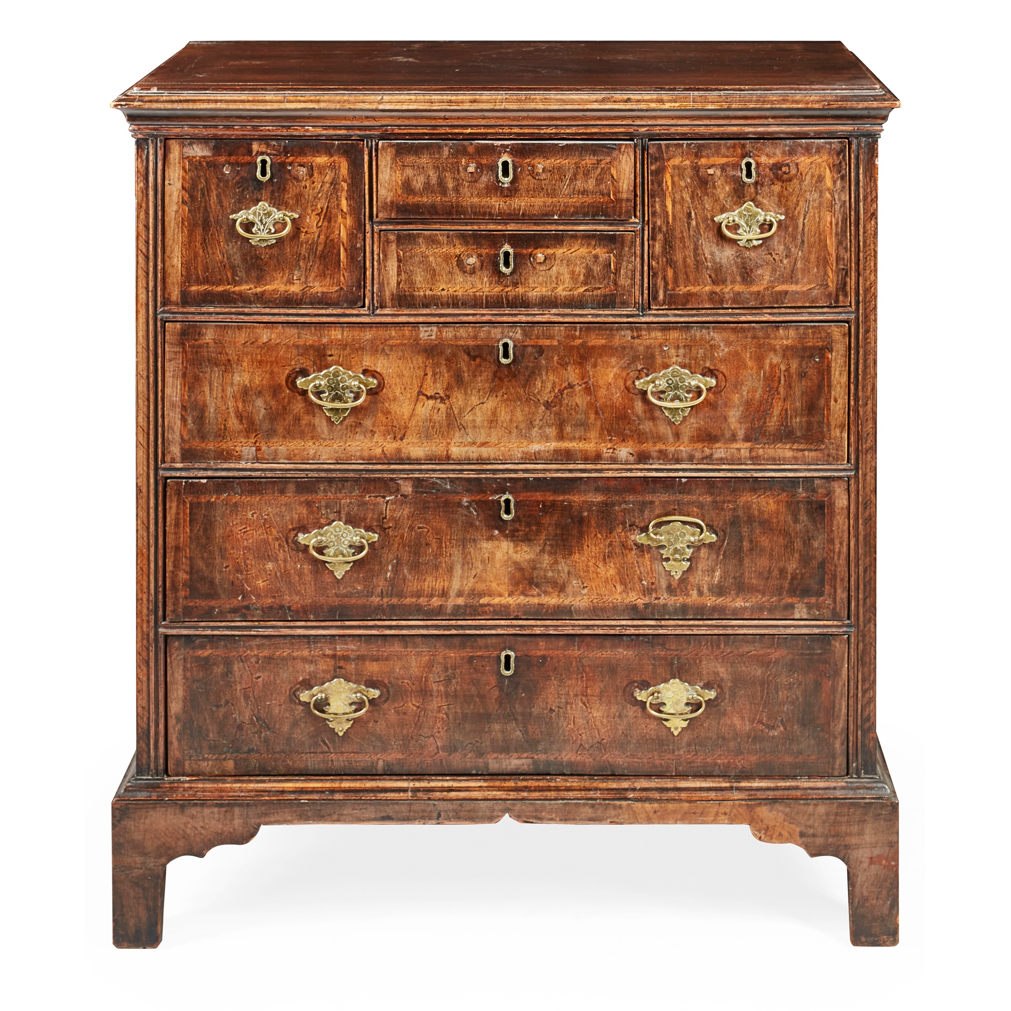 GEORGE II WALNUT AND FEATHER BANDED CHEST OF DRAWERS