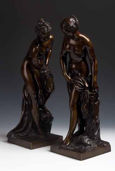 A pair of bronze bathing nymphs