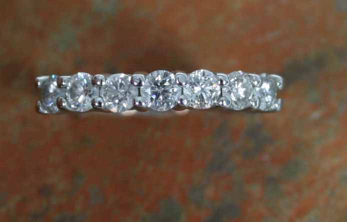 A diamond half-eternity ring,
