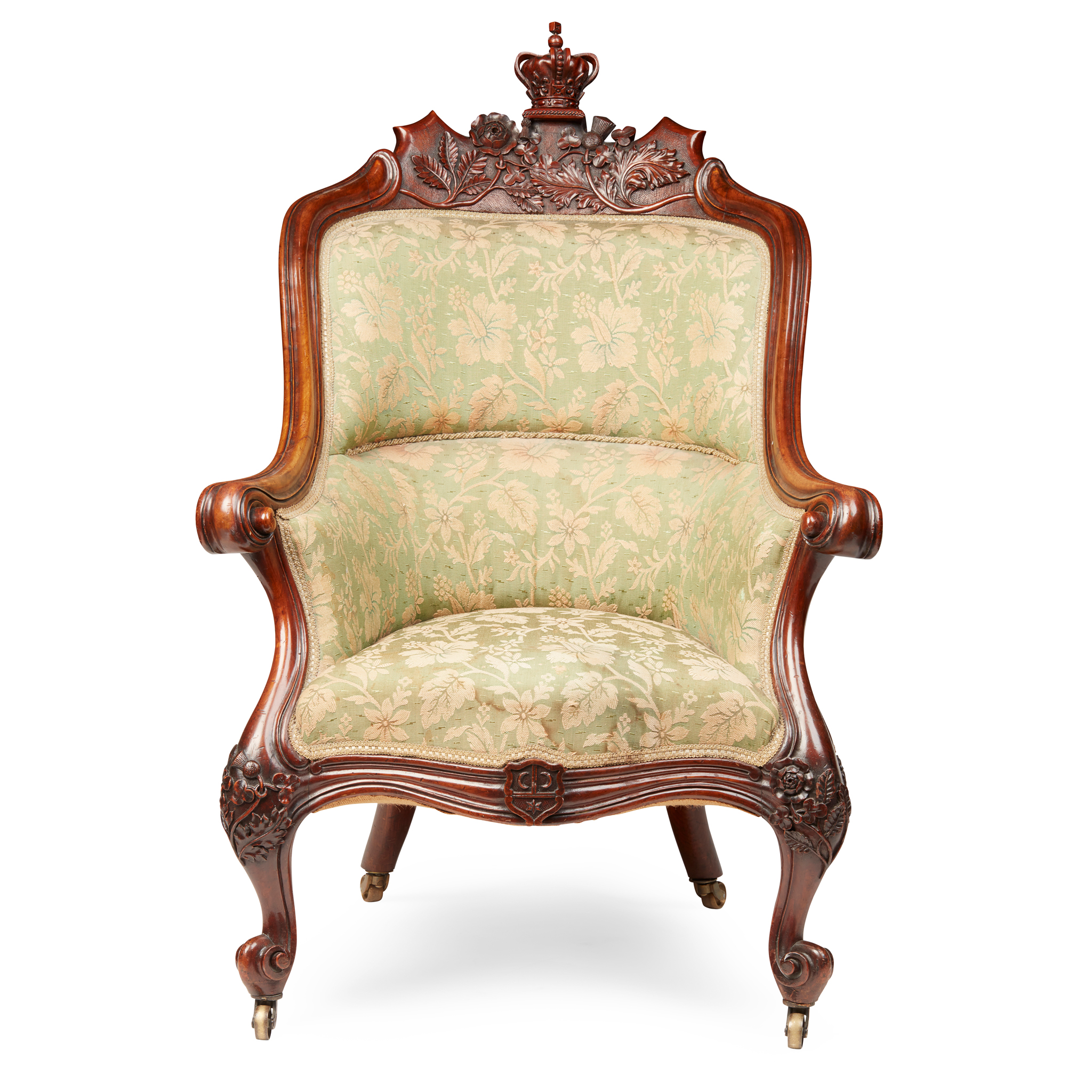 EARLY VICTORIAN WALNUT UPHOLSTERED ARMCHAIR