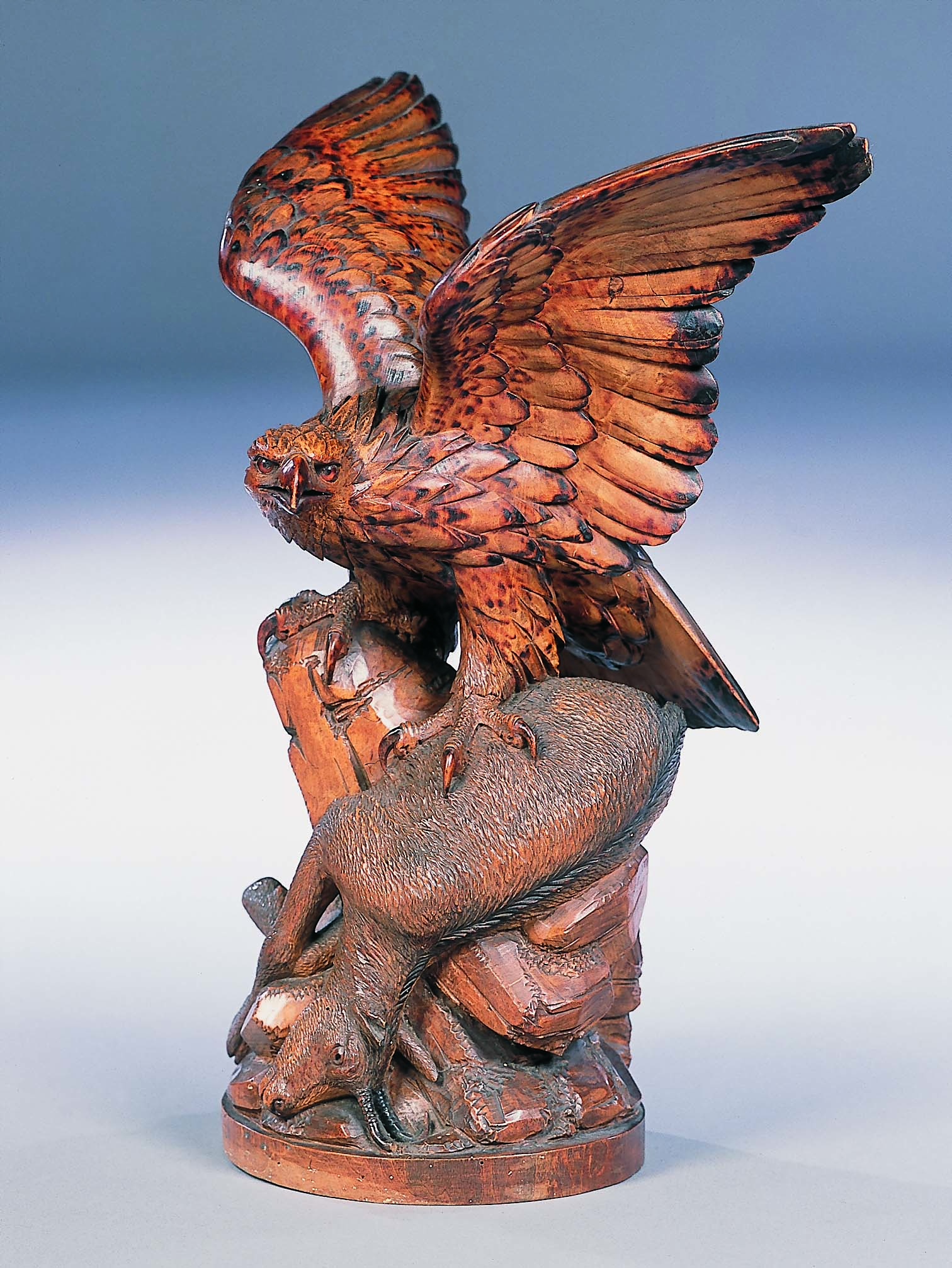 A 19th century Black Forest carved limewood figure group