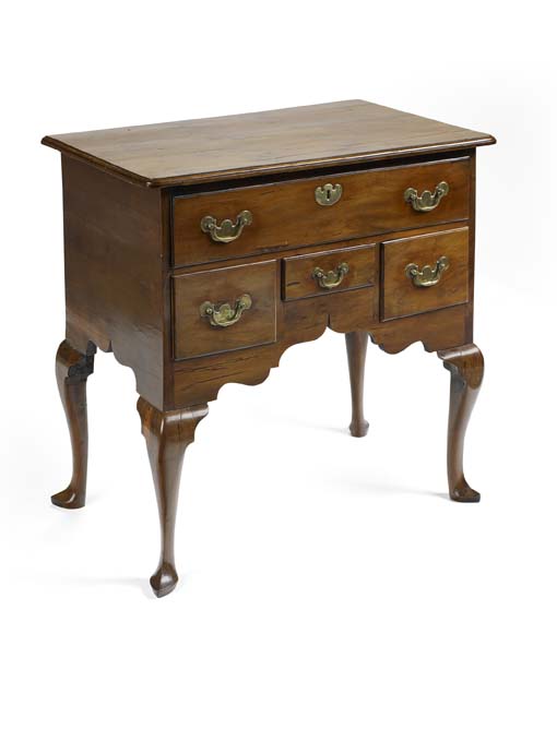 A mid 18th century yew-wood lowboy