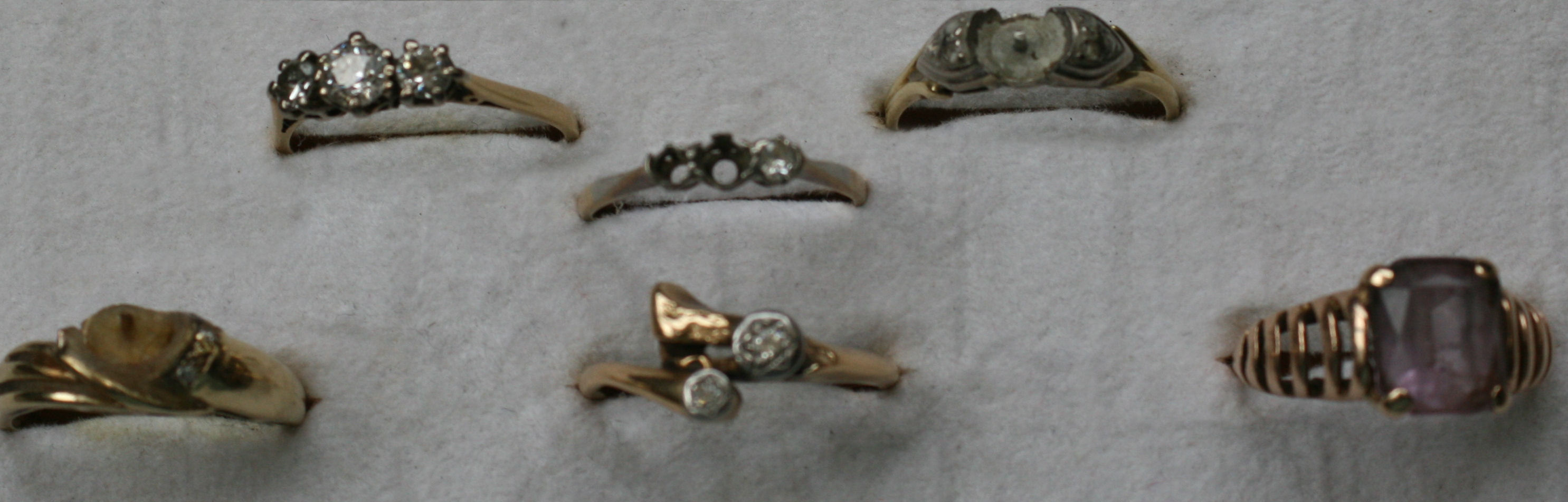 A group of six gold, diamond and gem set rings