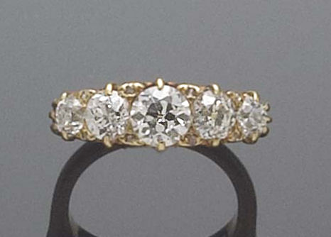 An 18ct gold mounted diamond five stone ring,