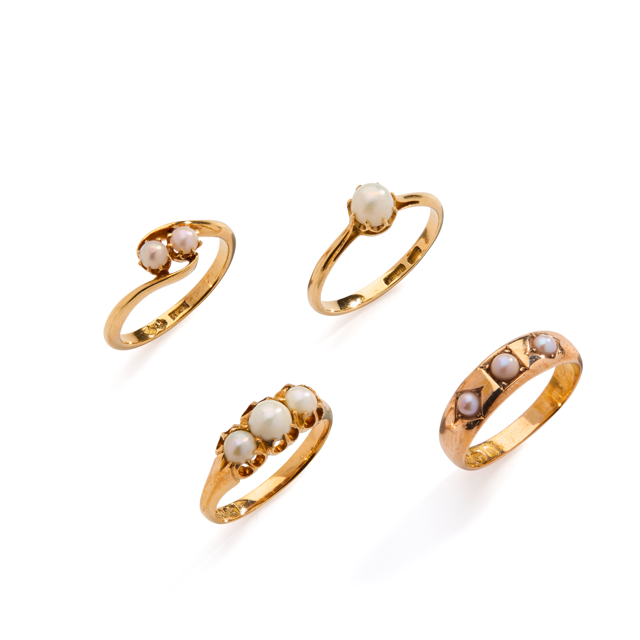A COLLECTION OF FOUR SCOTTISH FRESHWATER PEARL RINGS