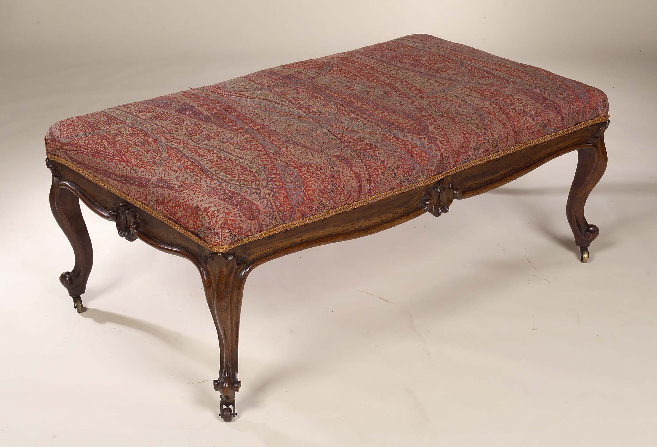 A large Victorian rosewood centre stool,