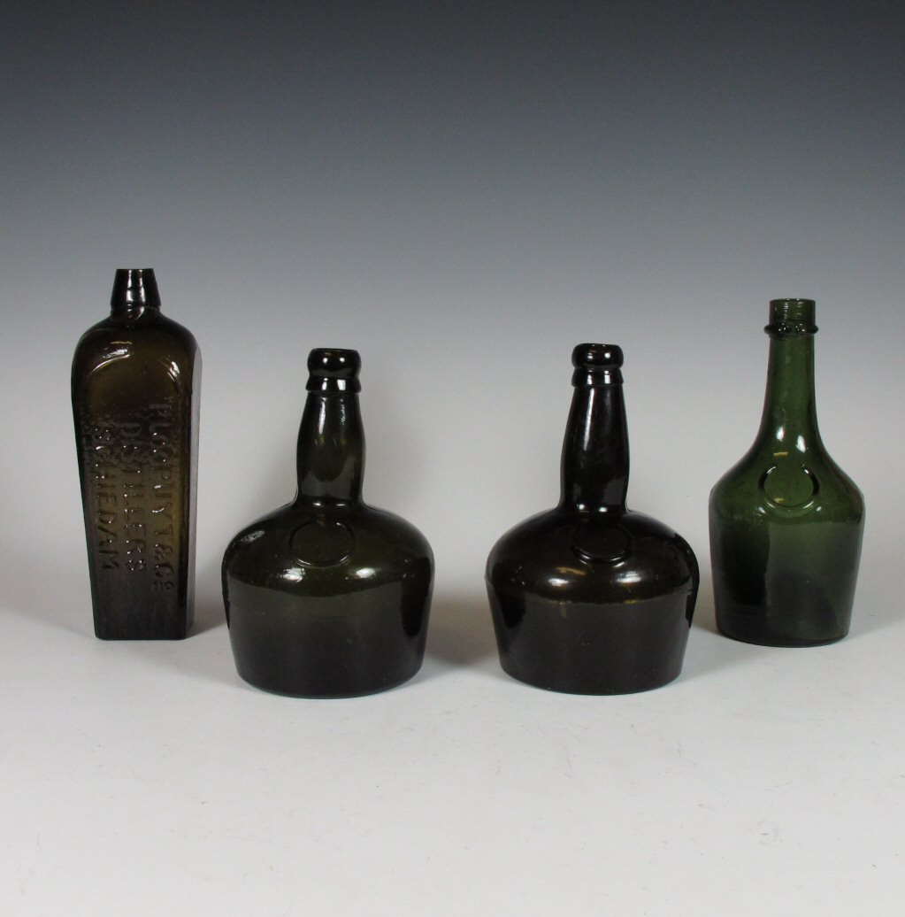 Two 18th/ 19th century green glass wine bottles