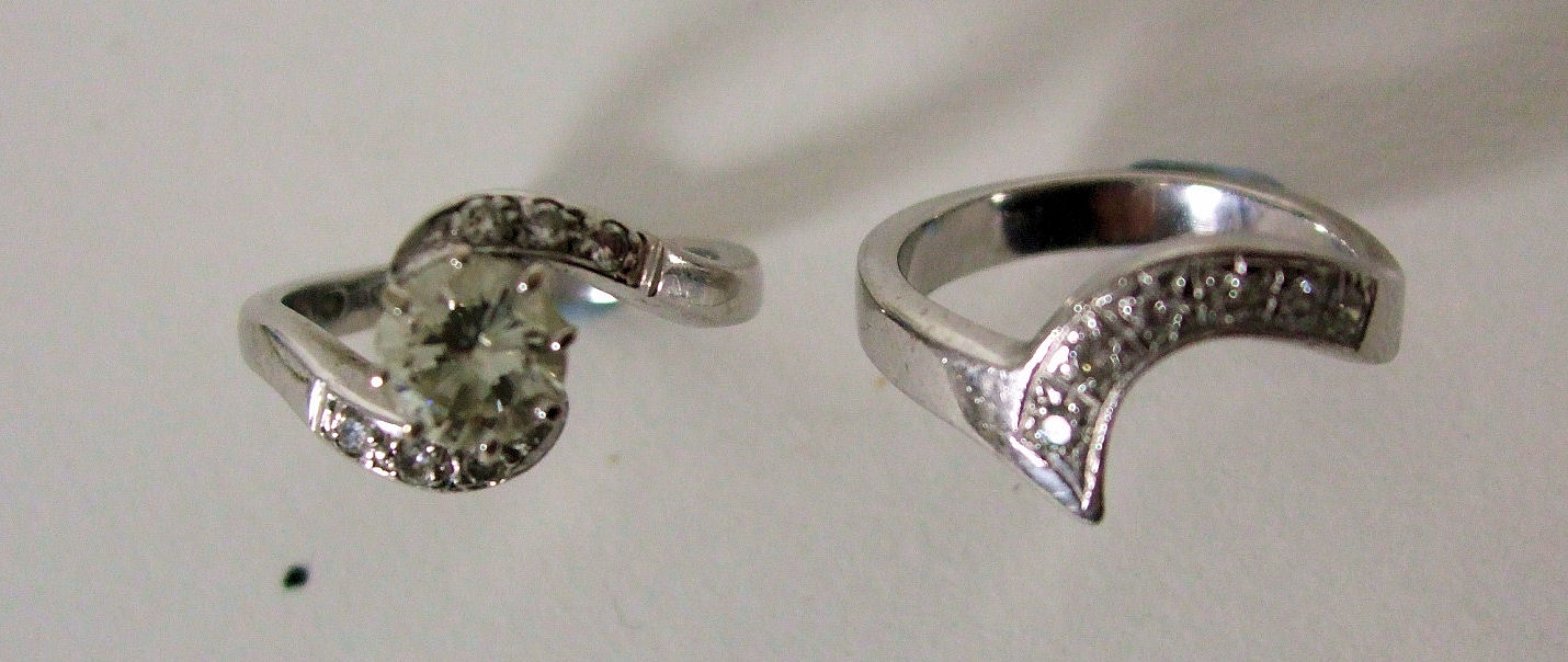 An 18ct white gold and diamond cluster ring