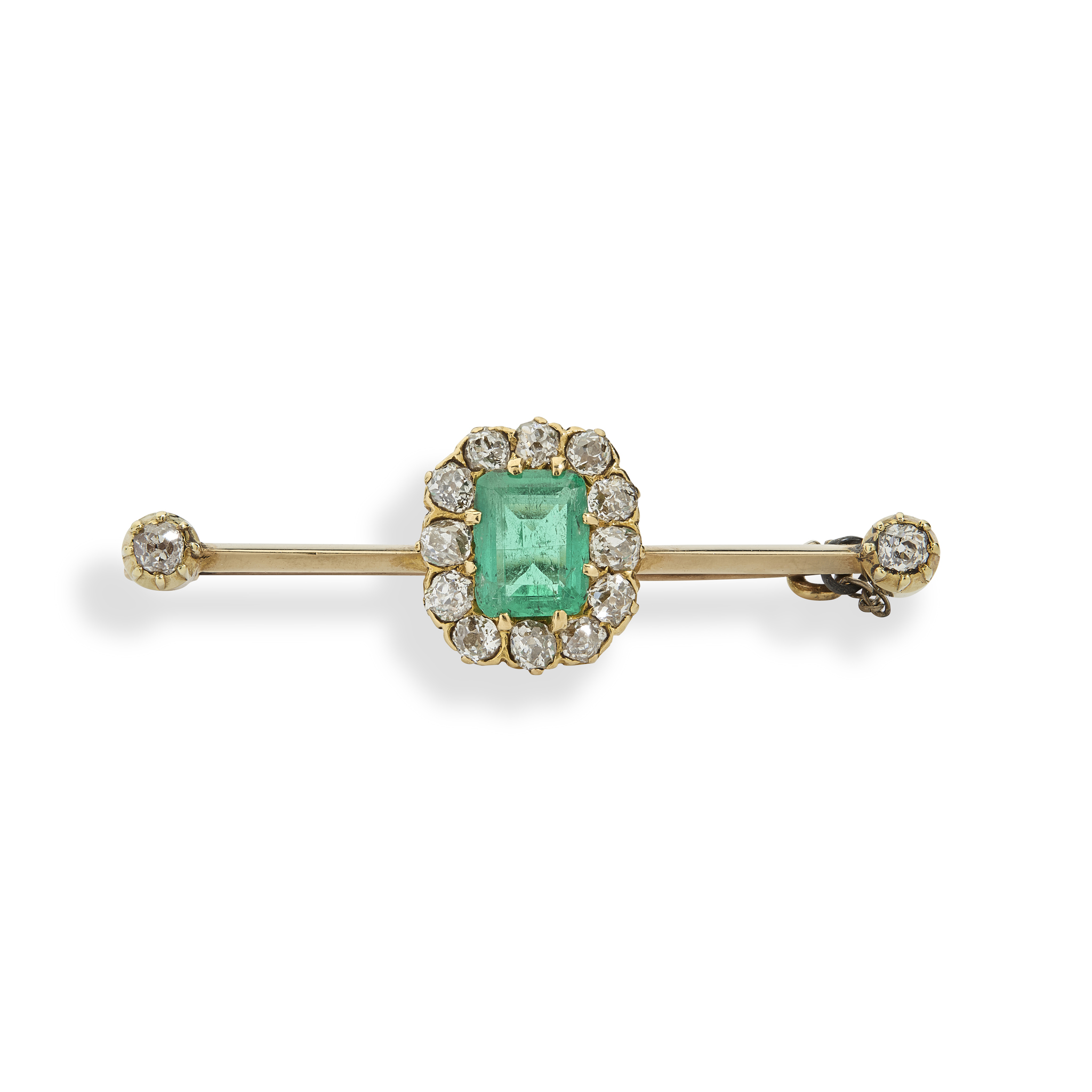 An early 20th century emerald and diamond bar brooch