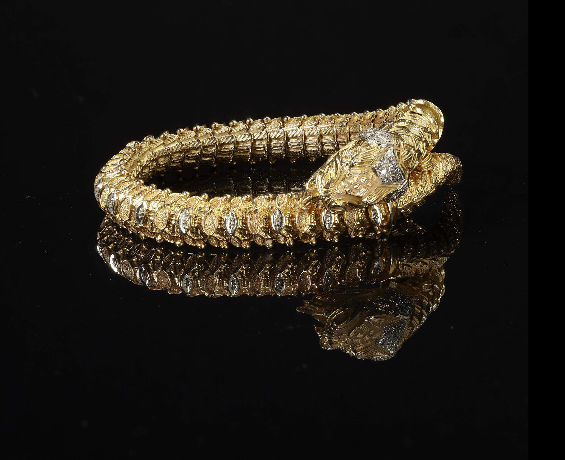 A diamond set snake form bracelet