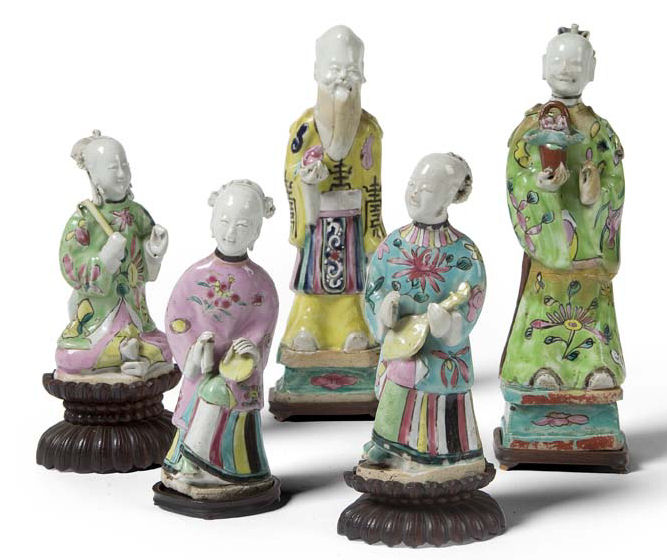 A group of five different 18th century Chinese famille rose porcelain figures