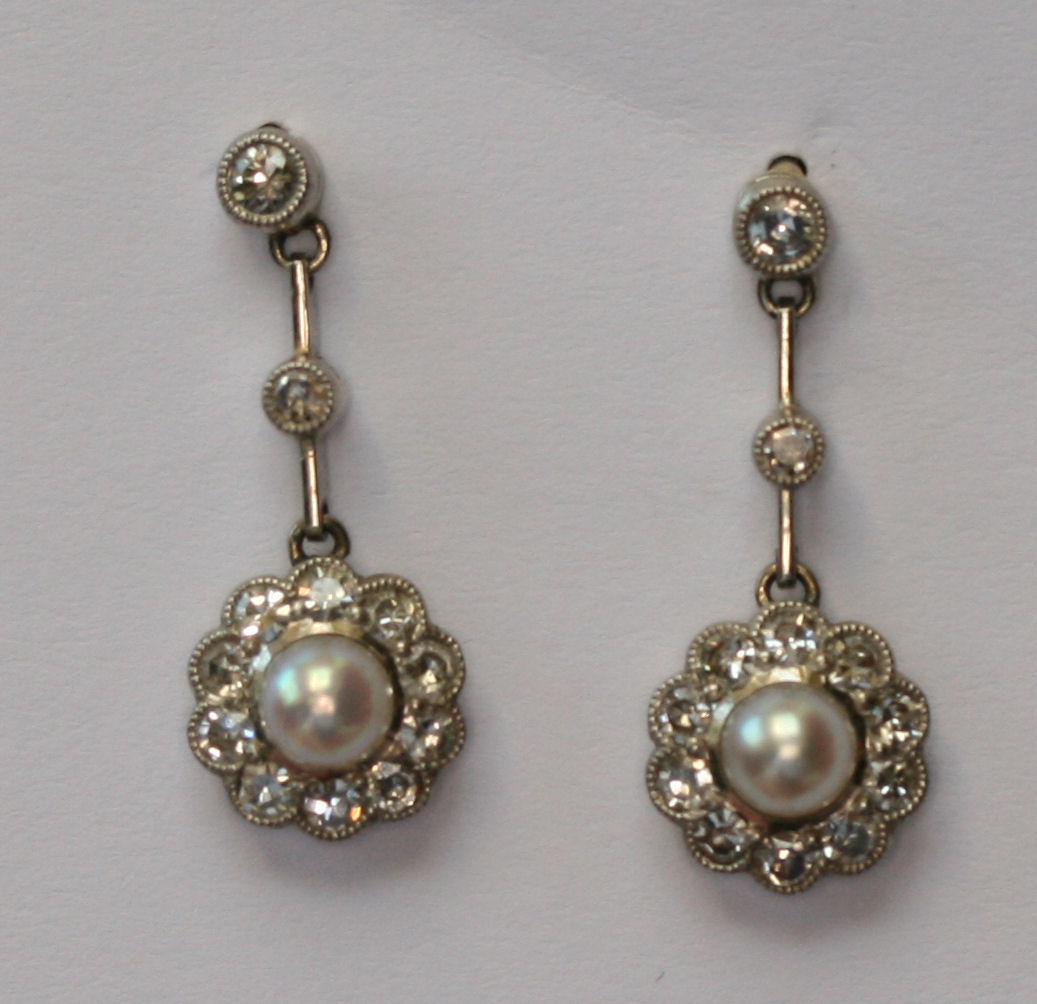 A pair of pearl and pendant ear drops