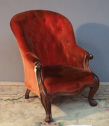 A Victorian rosewood open armchair