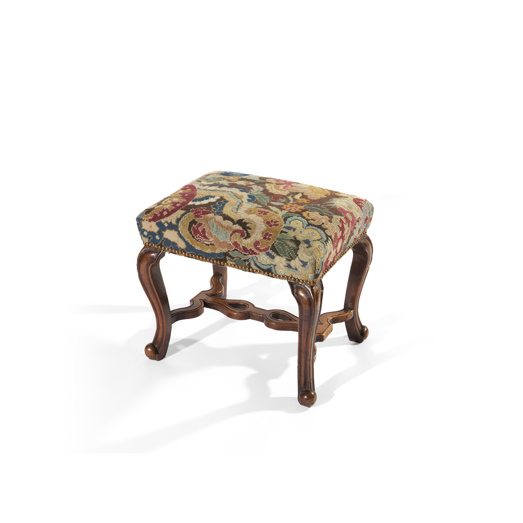 A QUEEN ANNE WALNUT AND UPHOLSTERED STOOL
