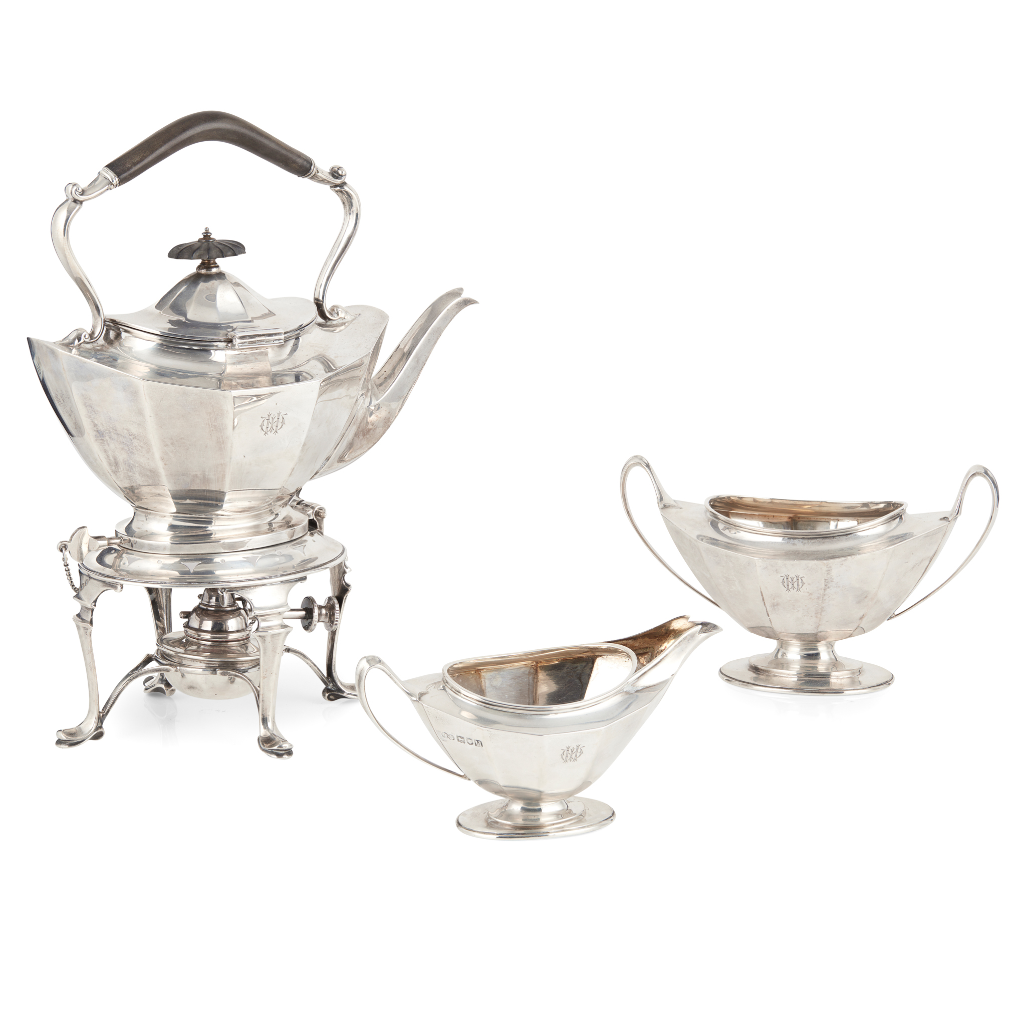 A George V matched three-piece spirit kettle, sugar basin and milk jug