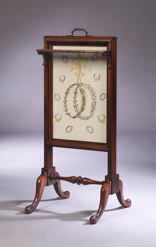 A Victorian rosewood firescreen