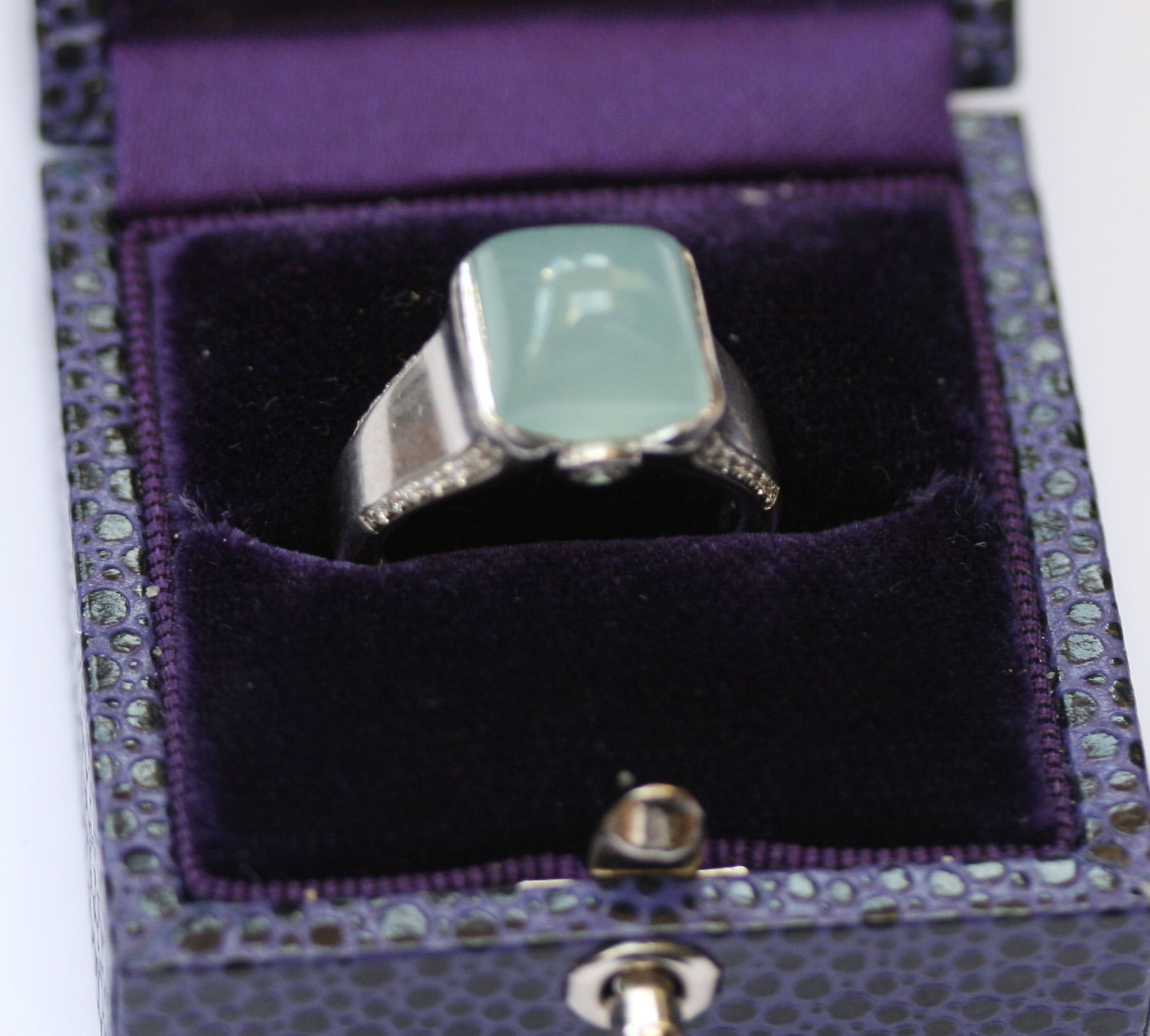 A contemporary 18ct white gold, moonstone and diamond ring