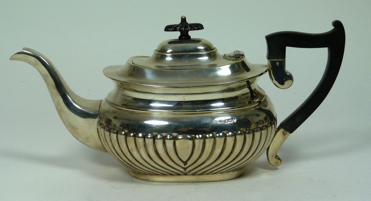 A three piece tea set