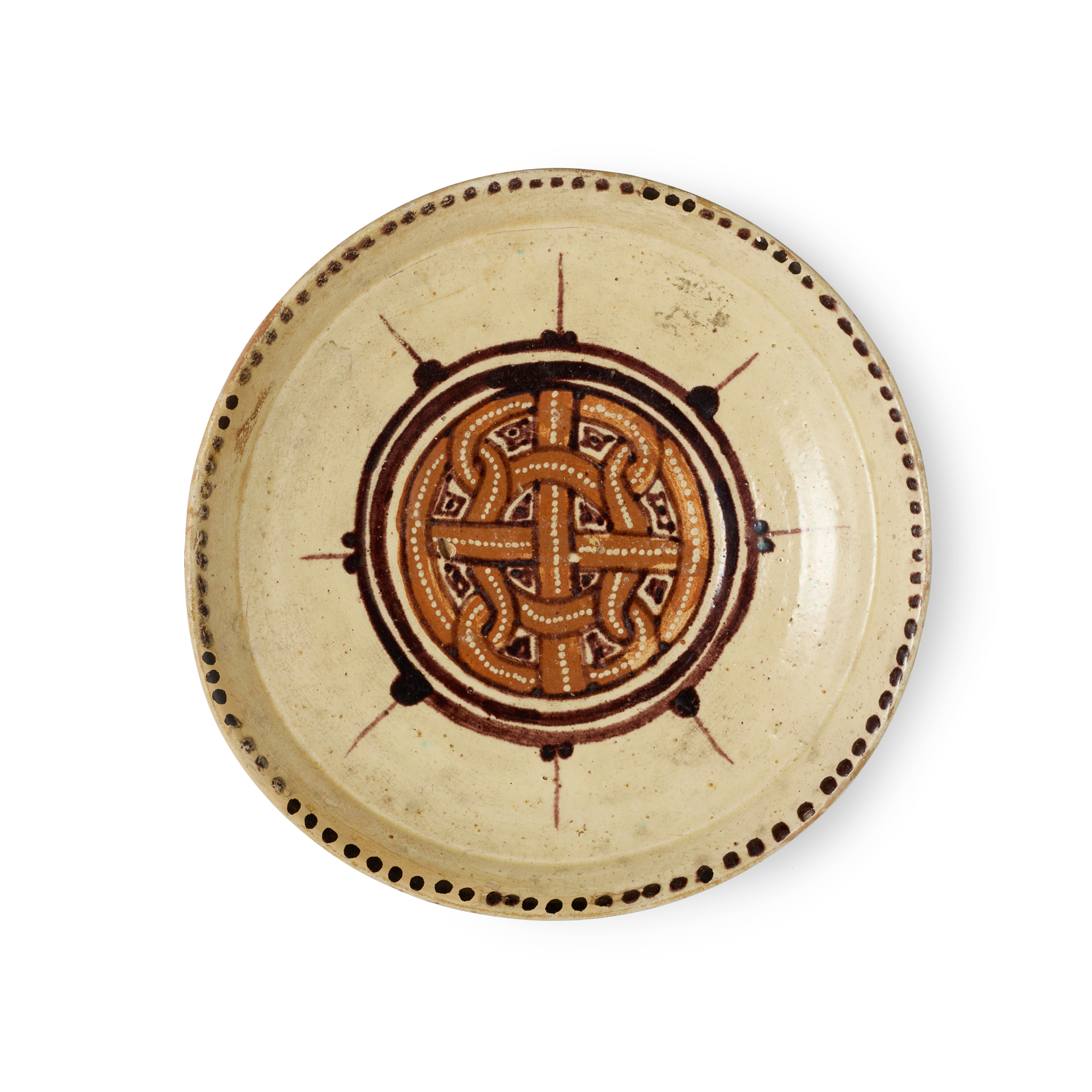A MINIATURE SAMANID SLIP-PAINTED POTTERY DISH WITH INTERLACE DESIGN