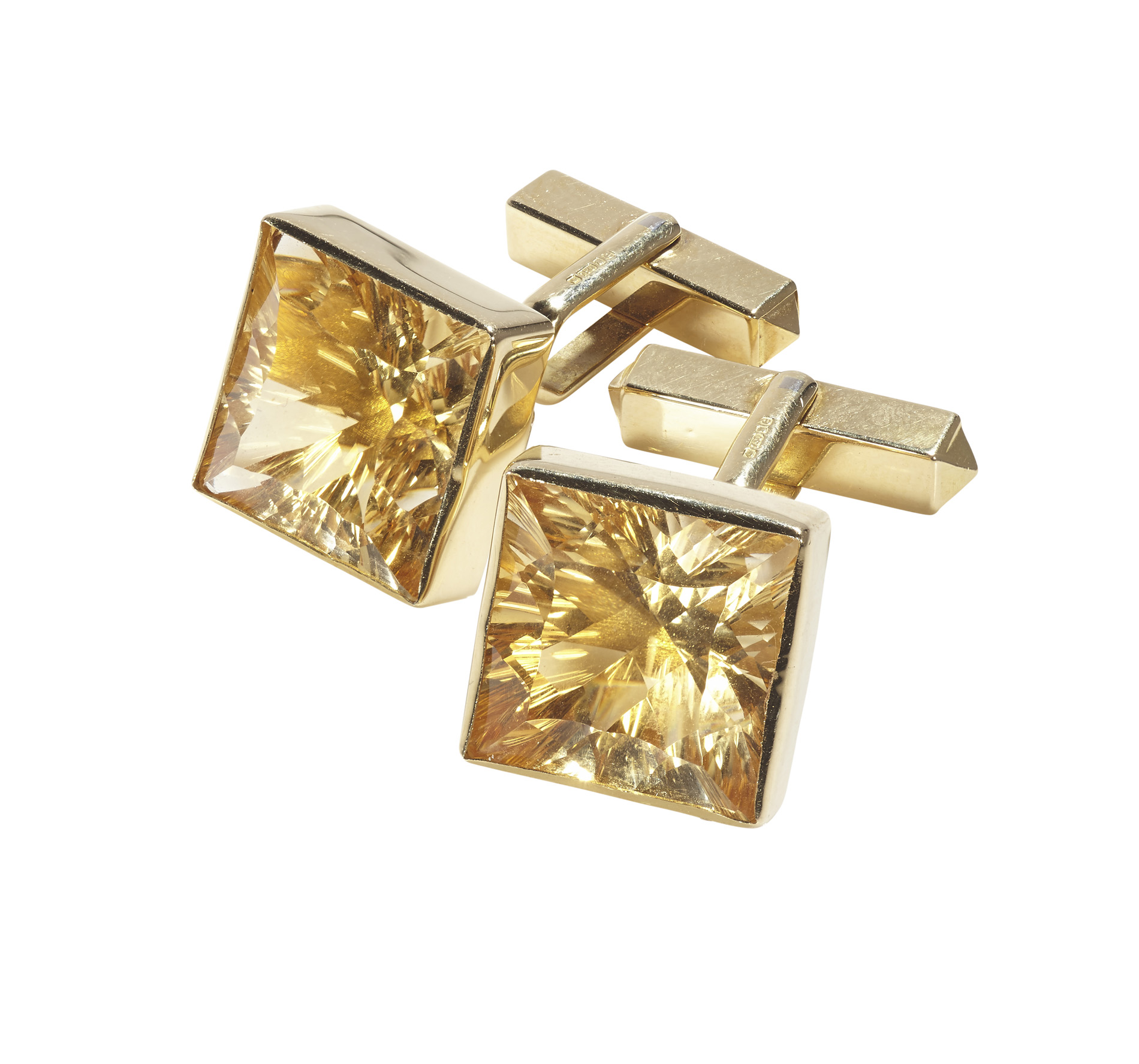 ALISTIR WOOD TAIT - a contemporary pair of 18ct gold mounted citrine set cufflinks