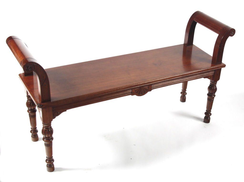 A late 19th century stained wood window seat