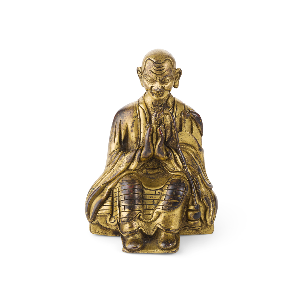 GILT-BRONZE FIGURE OF A SEATED LUOHAN