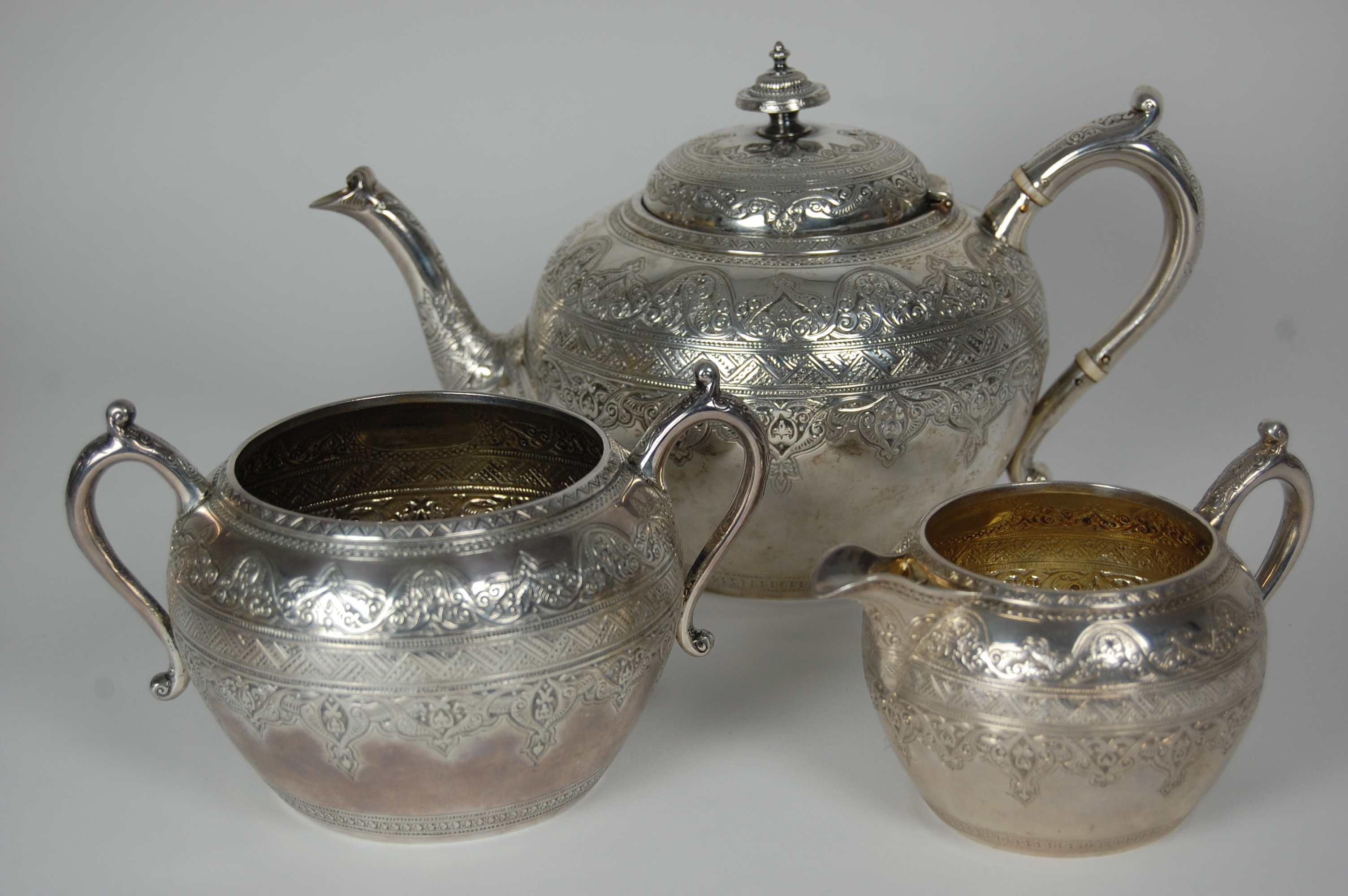 A late Victorian three piece tea set