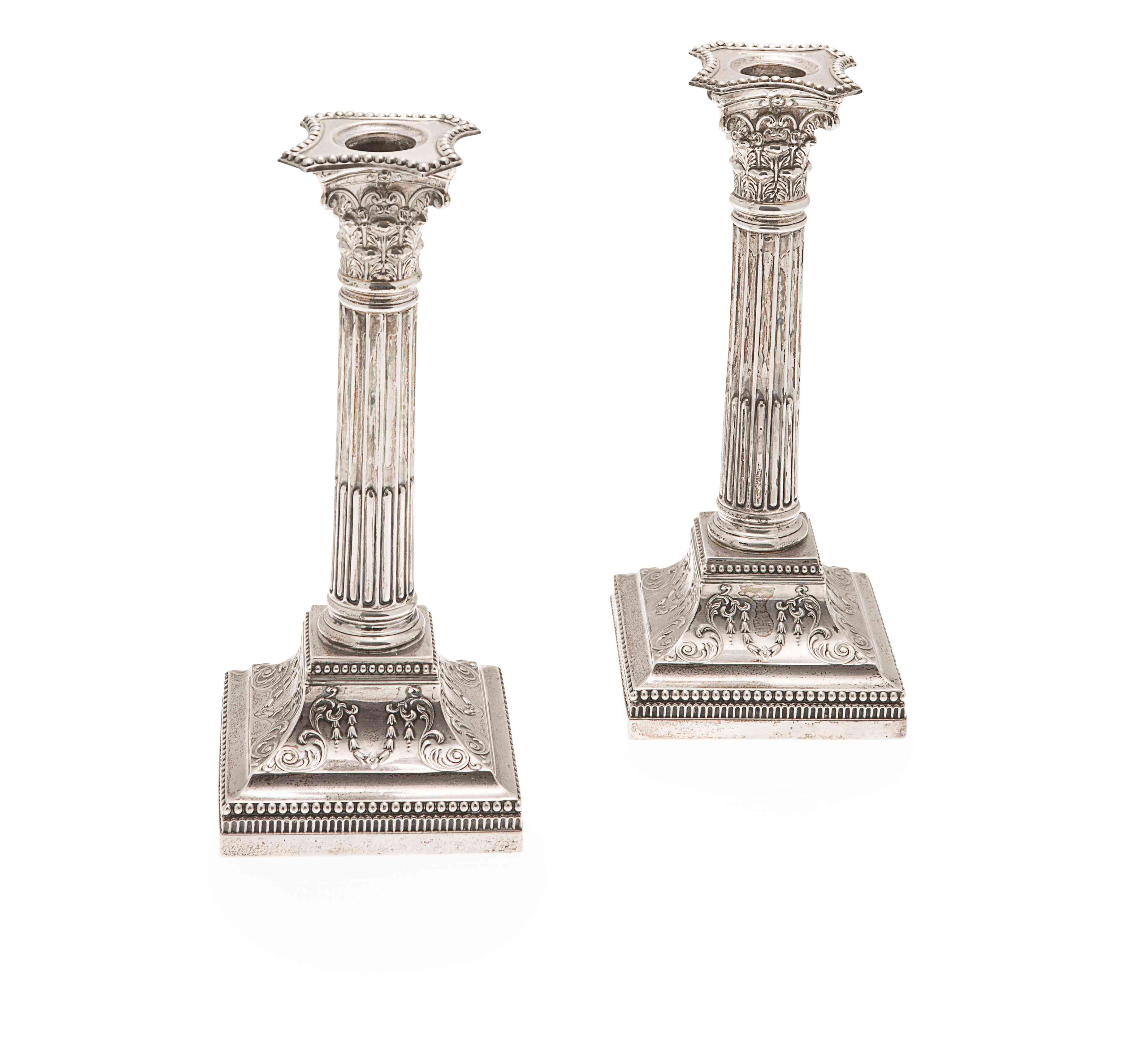A pair of silver candlesticks