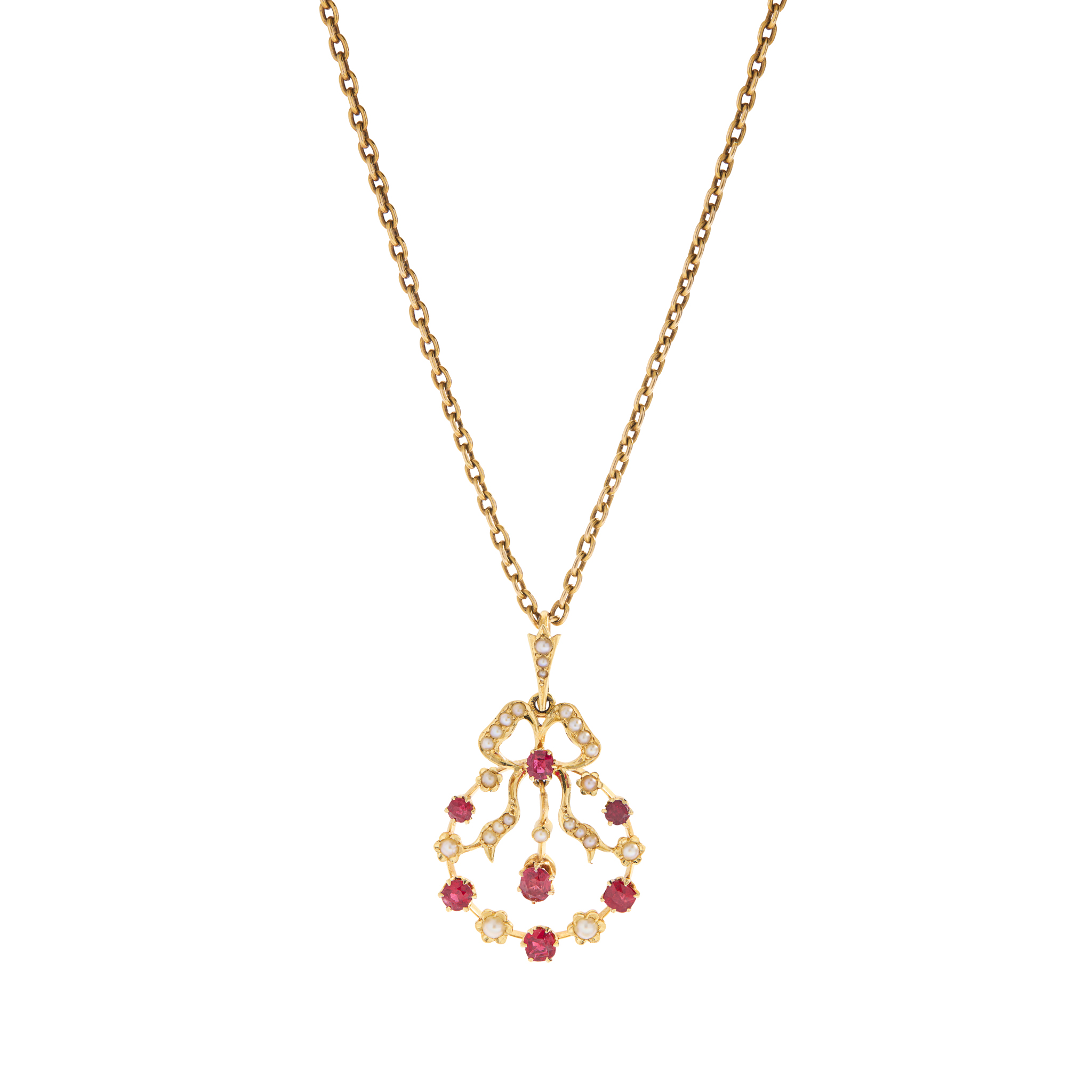 An early 20th century seed pearl and red gem pendant necklace