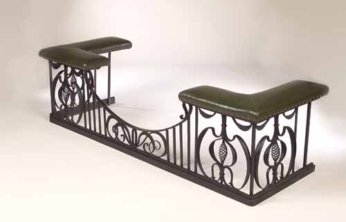 A wrought iron fender stool by Thomas Hadden, Edinburgh,