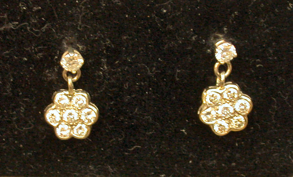 A pair of diamond pendant earrings,