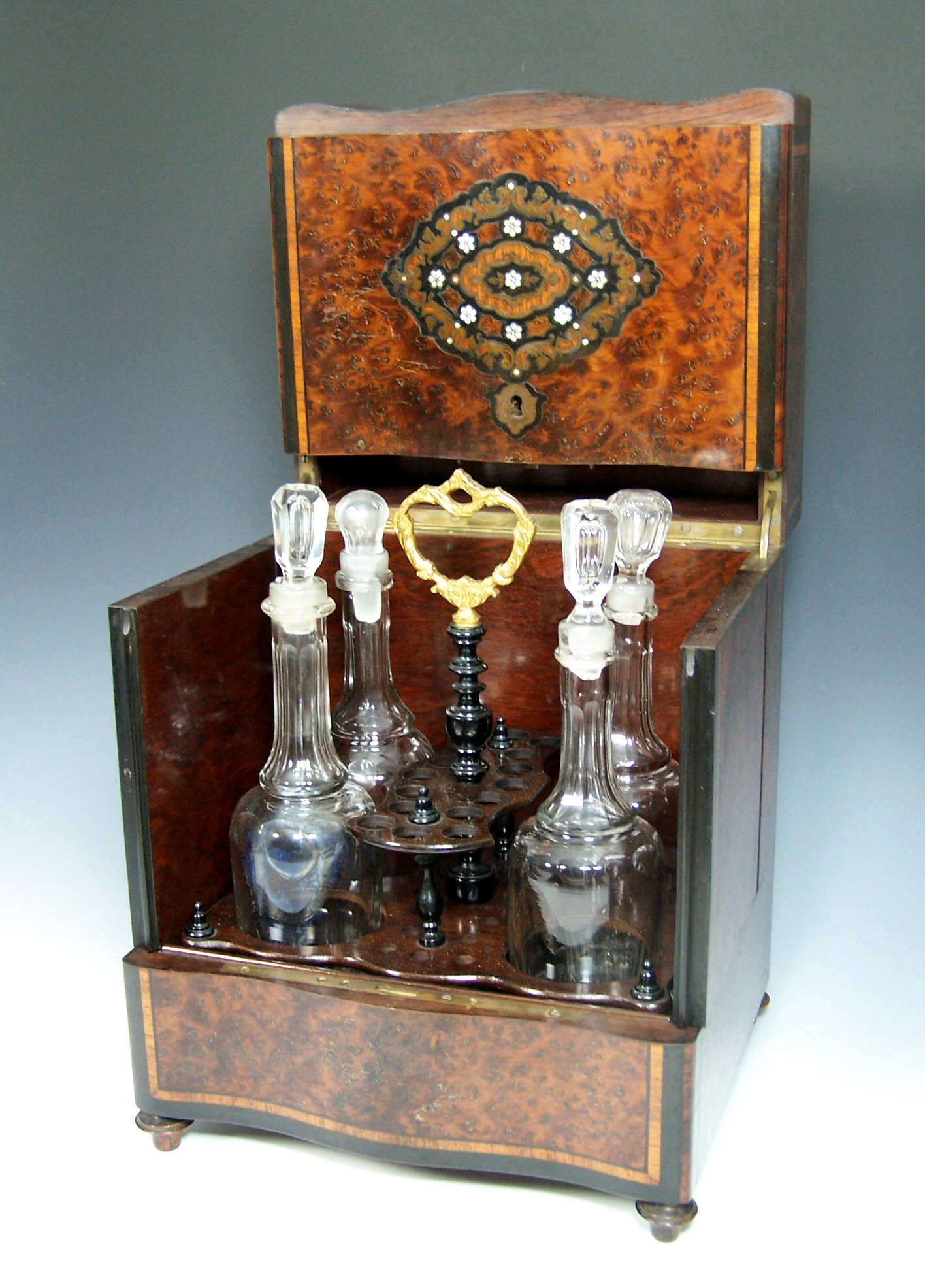 A 19th century amboyna and ebonised decanter box